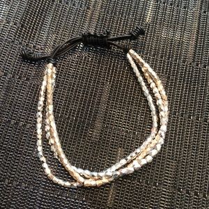 Adhustable silver beaded bracelet